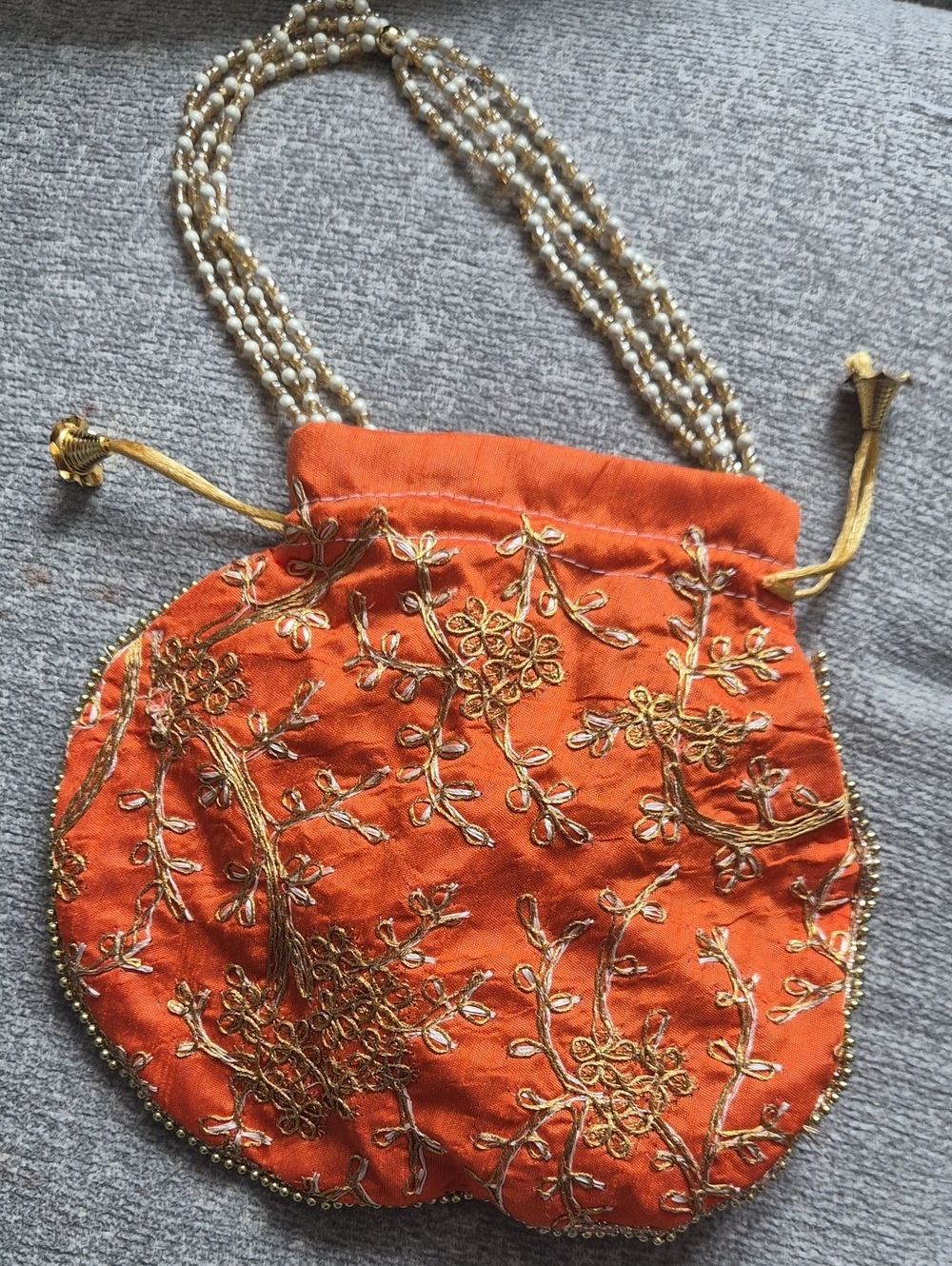 Embroidered Orange Drawstring Evening Bag with Beaded Strap